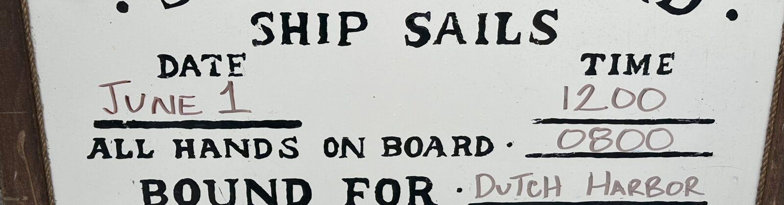 Whiteboard sign indicating when the Atlantis is departing