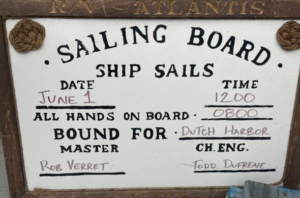 Whiteboard sign indicating when the Atlantis is departing