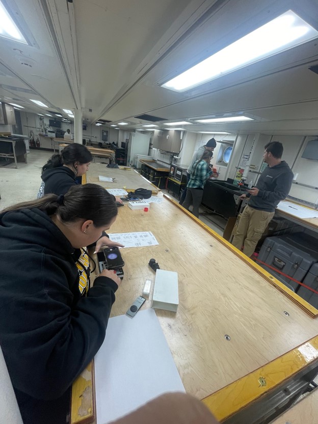 Scientists in the lab using smart phone microscopes