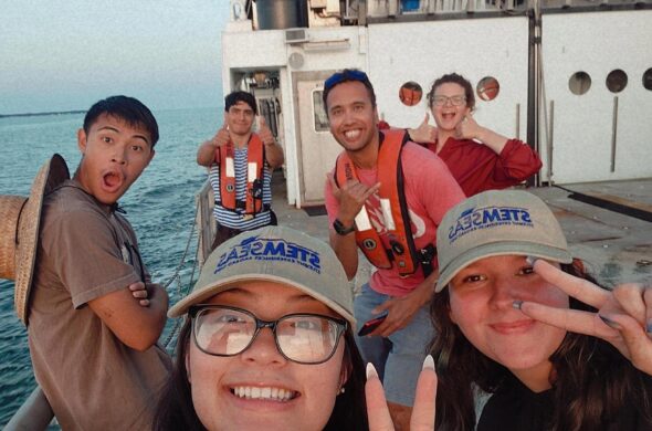 students and crew in the clurb