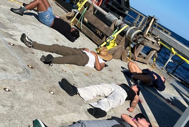 sleeping on the deck of the ship