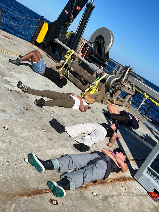 sleeping on the deck of the ship