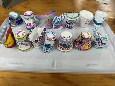 styrofoam cups with drawings on them